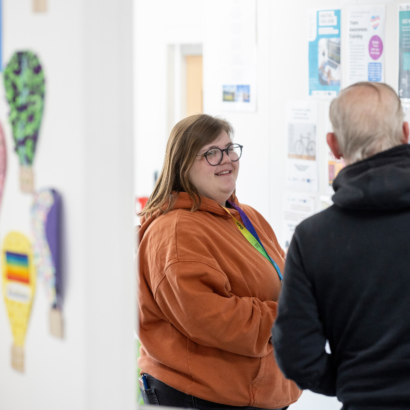 A Seetec employee talking to a participant in one of our CFO Activity Hubs